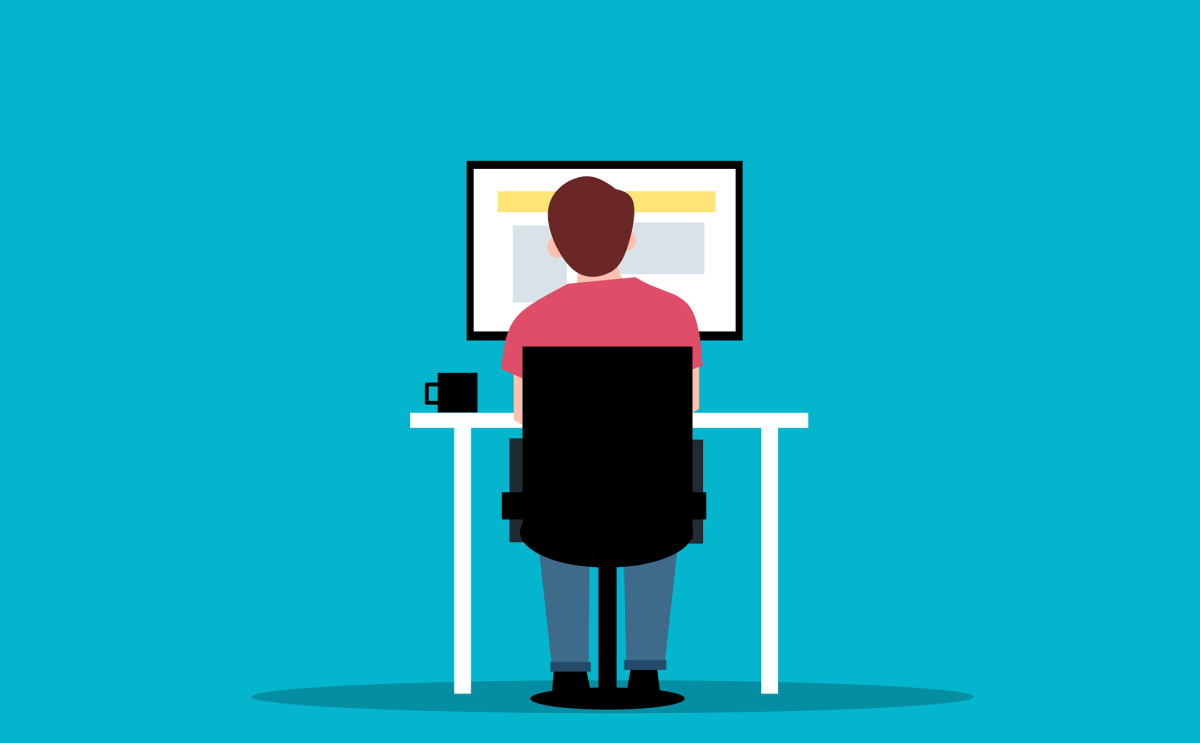 Zdjęcie ilustracyjne: grafika z mężczyzną siedzącym przy biurku przed ekranem komputera