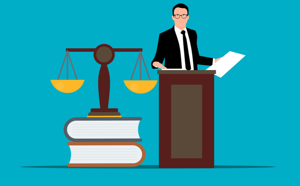 Zdjęcie ilustracyjne: grafika przedstawia mężczyznę na mównicy, obok którego stoi waga, jako symbol sprawiedliwości