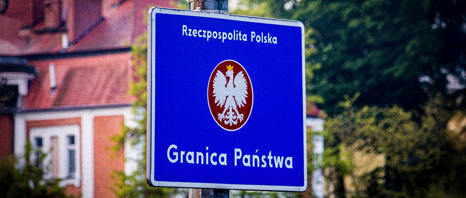 Tablica z napisem Granica Państwa i Godłem RP